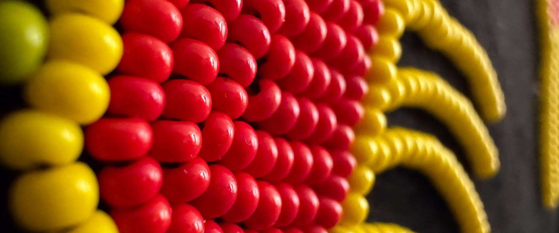 zoomed-in red and yellow métis beadwork